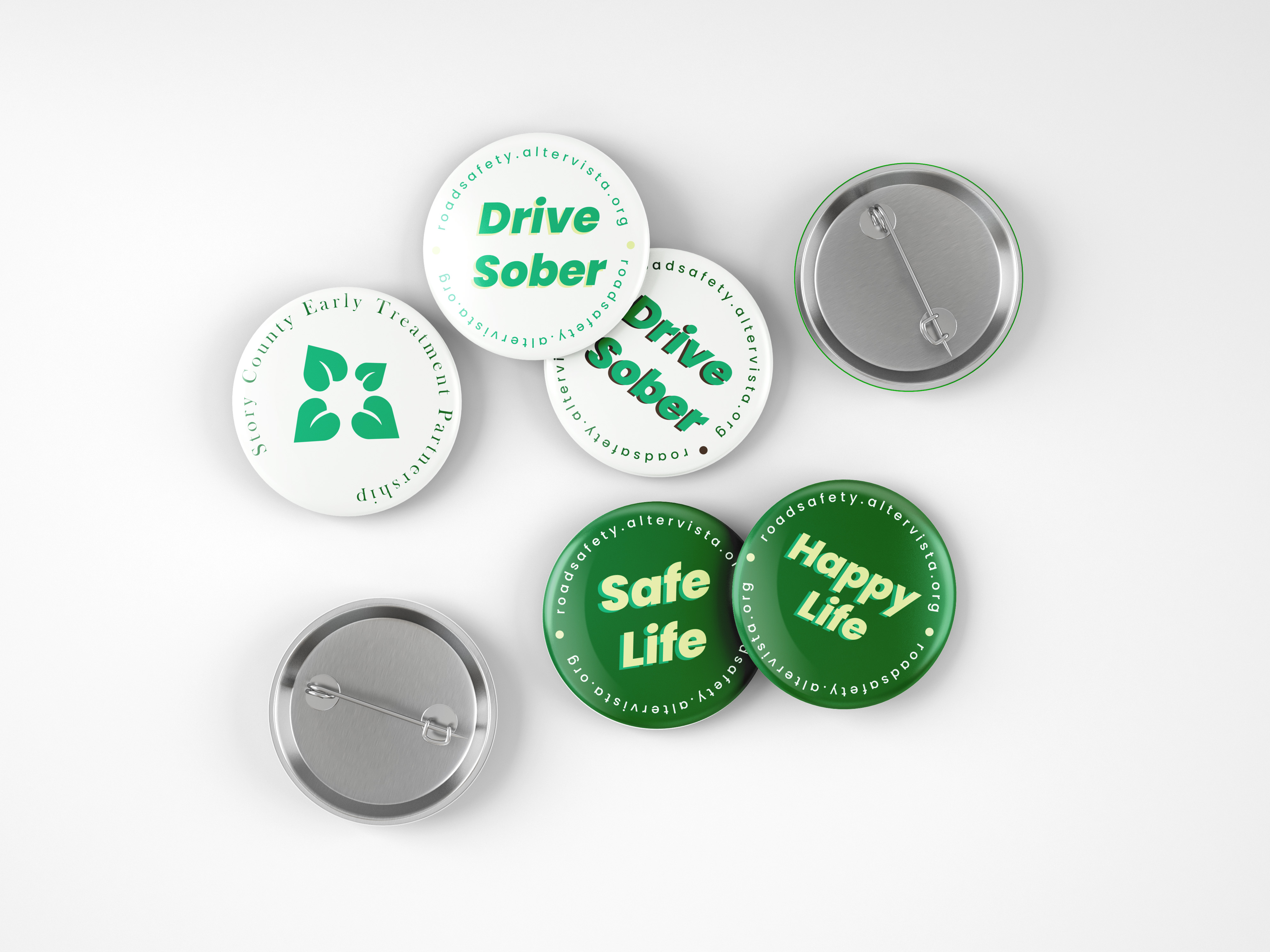 Mockup of pins that have positive messaging on them such as 'Healthy Life' and 'Sober Life'